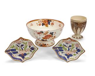 1206
Four English ceramic vessels
19th century
Wedgwood stamped: Eastern Flowers / Wedgwood / Etruria England; further painted: LL 6034
Comprising A Wedgwood footed punch bowl in the 'Eastern Flowers' pattern (7" H x 12" Dia.), a pair of English ironstone diamond-form dishes (8" W x 9.5" D), and a Wedgwood creamware vessel (6.5" H x 5" Dia.)
4 pieces
Estimate: $300 - $500