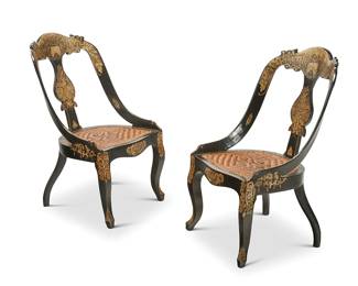 1316
A pair of black and gilt japanned side chairs
20th century
Each marked to metal plaque applied verso: Mohd. Ayub Khan & Sons / Specialists in Distinctive & Inexpensive Furniture / Civil Lines, Bareilly, U.P.
In the Indian taste, each chair with gondola backs and baluster-form splats above caned seats with square cabriole legs
2 pieces
Each: 24" H x 18.75" W x 19.5" D
Estimate: $400 - $600