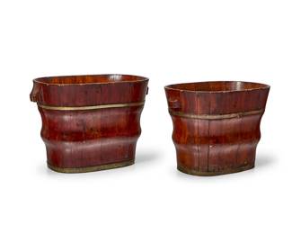 1052
Two Chinese brass-mounted wood baby baths
19th century
The lacquered wood baths, each with ribbed body, constructed from staves bound by brass bands, with opposed carved handles
2 pieces
Taller: 14.5" H x 21" W x 13.75" D; Shorter: 14" H x 20" W x 13" D
Estimate: $200 - $300