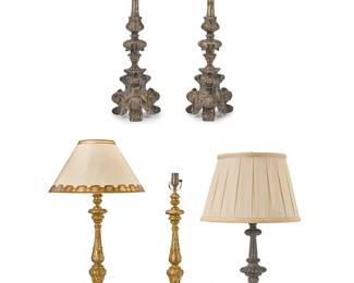 1057
A group of Baroque-style candlesticks
Late 20th/early 21st century
Composite labeled: Made in China
Comprising a pair of carved giltwood candlestick-form single-light table lamps, one with a paper shade (each without shade: 31" H), a composite candlestick-form table single-light lamp with pleated fabric shade (28" H), and a pair of carved wood pricket sticks, each with a metal gallery top (each: 24" H), three electrified
5 pieces
Estimate: $200 - $300