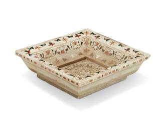 1324
An Indian inlaid marble basin
20th century
With polychrome floral vinery designs
6" H x 21" W x 23" D
Estimate: $400 - $600