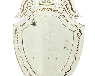 1118
A Venetian shield-form wall mirror
19th century
The nine-paneled mirror with etched scroll and foliate motifs
35.5" H x 23" W
Estimate: $1,000 - $1,500