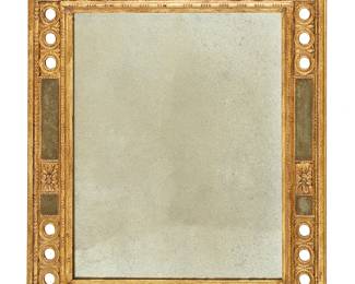 1034
A carved giltwood parclose mirror
20th century
The frame with mirrored parclose panels, floral medallions at corners, and bead and barrel trimmings throughout
32" H x 28" W
Estimate: $150 - $250