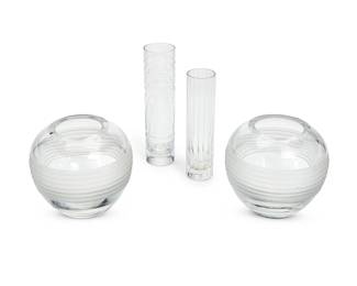 1209
A group of Baccarat glass vases
Late 20th/early 21st century
Three with factory stencil mark; one with etched script mark
Comprising a pair of clear and frosted glass low bulbous vases (5.25" H x 6.25" Dia.), a small ribbed cylindrical bud vase (7" H x 1.75" Dia.), and a cylindrical 'Orgue' bud vase (8" H x 2" Dia.)
4 pieces
Estimate: $300 - $500