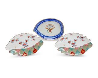 1143
Three Mottahedeh porcelain dishes
20th century
The first marked to underside: Eagle Created for America Circa 1810 / With Classic Border of the Period; the pair marked: Reproduction of a Meissen Leaf Dish about 1735 / From The Collections of the Prince of Liechtenstein / Produced for The Metropolitan Museum of Art and The Collections of the Prince of Liechtenstein
Comprising an Americana-style reproduction leaf-form dish (7.875" W x 5.75" D), and a pair of leaf-form dishes, each a reproduction of a Meissen leaf dish (1.5" H x 9" W x 6" D)
3 pieces
Estimate: $200 - $300