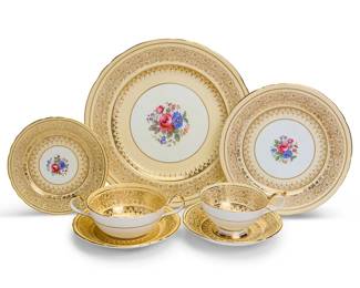1137
An Aynsley porcelain 'Hampshire' part dinner service
After 1934; England
Each with green printed factory marks above printed gilt pattern name or red painted pattern: 7771
Comprising twelve 10.25" dinner plates, twelve 8" side plates, twelve 6.125" bread & butter plates, twelve soup cups with twelve 6.25" saucers, and twelve teacups with twelve 5.875" saucers
84 pieces
Estimate: $400 - $600
