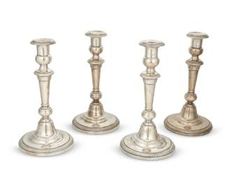 1352
Two pairs of American sterling silver weighted candlesticks
20th century
One pair marked to underside: Sterling by / Frank M. Whiting & Company / 2328; the other pair marked: Sterling by / Ellmore
4 pieces
Each: 10" H x 5.125" Dia.
Estimate: $450 - $650
