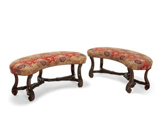 1306
A pair of Baroque-style upholstered carved wood benches
20th century
Each of kidney shape with fabric-upholstered seat on carved wood legs joined by a stylized stretcher
2 pieces
Each: 21" H x 48" W x 23" D
Estimate: $400 - $600