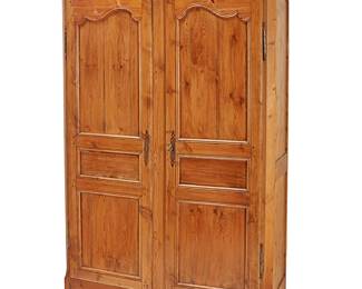 1295
A French Provincial pine armoire
19th century
The wood armoire with two locking hinged cabinet doors revealing an updated interior of five shelves and two sliding drawer compartments
92.5" H x 62" W x 26" D
Estimate: $700 - $900