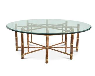 1202
A McGuire large bamboo and glass dining table
Late 20th century
The octagonal frame of bound bamboo construction surmounted by a round glass top
Overall: 29" H x 83" Dia.
Estimate: $300 - $500