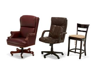 1271
Three Contemporary upholstered chairs
Late 20th/early 21st century
Comprising a Crate & Barrel ebonized wood bar chair with cream fabric upholstered seat cushion (38.5" H x 17.5" W x 20" D), a brown leather upholstered executive desk chair (45" H x 26" W x 28" D), and a maroon leather executive desk chair with brass tacking above a wood base on casters (47" H x 30" W x 32" D)
3 pieces
Estimate: $100 - $200