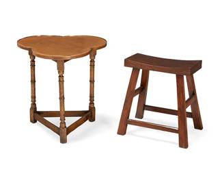 1294
A cloverleaf tavern table and a saddle stool
20th century
Comprising a trefoil-top table raised on three turned legs joined by rectangular stretchers, and a joined wood stool
2 pieces
Table: 23" H x 22.75" W x 22.75" D; Stool: 19.5" H x 17.5" W x 14" D
Estimate: $100 - $200