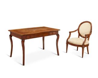 1041
A Louis XVI-style walnut open armchair and fruitwood side table
19th/20th century
Comprising a carved wood chair with pale yellow damask upholstery and a two-drawer side table, the drawers later lined in a moiré fabric
2 pieces
Chair: 38" H x 23.5" W x 24" D; Table: 29.5" H x 47" W x 29.5" D
Estimate: $300 - $500