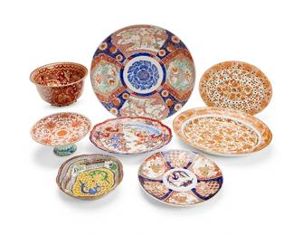 1187
A collection of East Asian porcelain vessels
20th century
Chinese polychrome dish marked: Made in China; the last marked: Porcelain / Made in China / Hand Painted in Macau / Not Suitable for Food Serving
Comprising a Chinese Export footed compote, with iron red lotus decoration and shou medallions (4.5" H x 9.625" Dia.), a Chinese Export iron red and gilt oval serving dish with pierced insert and decorated with bird and butterfly motifs (16.5" W x 14" D), a Japanese Imari scalloped plate (13.5" W x 11" D), a Japanese Imari charger (18.25" Dia.), another Japanese Imari charger (12" Dia.), a Chinese polychrome dish (2" H x 10.5" W x 9.5" D), and a Chinese red and orange-glazed bowl (5" H x 9.75" Dia.)
7 pieces
Estimate: $500 - $700