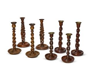 1139
Four pairs of barley twist wood candlesticks
20th century
One pair labeled: Made in Taiwan / Republic of China
Four with brass-mounted bobèches, each raised on a rounded base
8 pieces
Tallest pair: 13" H
Estimate: $200 - $300