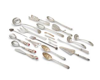 1353
A large group of silver-plated part flatware services and serving utensils
20th century
Most variously marked for maker; fish service with mark of John Round & Son
Comprising an English silver-plated fish service, a set of 12 forks and 12 knives, a set of 11 gilt-metal forks and 11 spoons with glass handles, and various serving utensils of various materials including silver plate, metal, porcelain, mother-of-pearl, horn, and wood and including serving spoons, ladles, forks, knives, salad servers, spatulas, cake servers, caviar spoons, cheese knives, skewers, grape shears, nutcrackers, salt cellars, and a set of 6 serving utensils with composition cream, red and blue rooster-form handles
Approximately 200 pieces
Estimate: $150 - $250