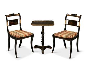1178
A Regency japanned tea table and pair of side chairs
19th century
Comprising a table with chinoiserie decoration and a brass gallery top centered by a figural scene, supported by a turned pedestal on a tripartite base, together with a pair of black and gilt japanned side chairs with tufted fabric upholstered seat cushions
3 pieces
Table: 26" H x 20" W x 16" D; Each chair: 33" H x 18" W x 18" D
Estimate: $500 - $700