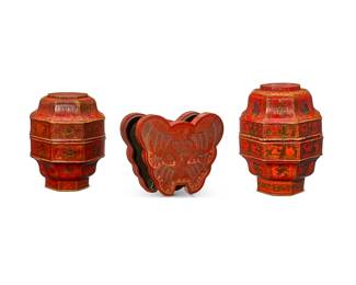 1098
Three Chinese red and gilt lacquer boxes
20th century
The gilt and red lacquered wood boxes, comprising two lantern-form stacking lunch boxes and one bat-form lidded box
3 pieces
Larger lunch: 15.25" H x 11" Dia.; Bat: 3" H x 12.5" W x 12" D
Estimate: $300 - $500