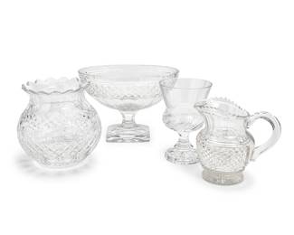 1280
A group of cut glass vessels
Late 20th/early 21st century
One marked for Waterford
Comprising a Waterford bulbous vase, an urn-form cut glass oval bowl with rectangular foot, a footed pitcher, and a footed vase with flared rim
4 pieces
Waterford: 8" H x 8.5" Dia.; Pitcher: 7.5" H x 7.75" W x 5.375" D
Estimate: $200 - $300
