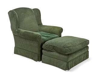 1129
A Contemporary overstuffed armchair and ottoman
Late 20th century
The two pieces upholstered in a green mixed fabric, the ottoman set on casters
2 pieces
Armchair: 41" H x 38" W x 39" D; Ottoman: 20" H x 34" W x 24" D
Estimate: $100 - $150