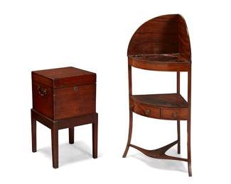 1085
An English mahogany washstand and cellarette
Late 19th/early 20th century
Comprising a Victorian corner washstand with apertures for a washbowl above a lower shelf with two faux drawers and one real drawer with later moiré lining, all supported by a three-arm stretcher joining gently arched legs, and a cellarette with locking hinged lid, on a wood stand
2 pieces
Washstand: 45.5" H x 23" W x 17" D; Cellarette overall: 28.5" H x 16.25" W x 16.25" D
Estimate: $400 - $600