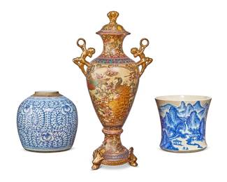 1127
A group of three ceramic vessels
20th century
Ginger jar with wax seal to underside; vessel with blue Chinese characters
Comprising a Satsuma-style gilt and polychrome footed covered urn decorated with peacocks and floral motifs, the shoulders with opposed Art Deco style hoop dancer handles, a Chinese blue and white porcelain ginger jar, lacking cover, and a Chinese porcelain waisted vessel with landscape decoration
3 pieces
Vase: 25" H x 13" W x 8" D; Jardinière: 8.125" H x 8.875" Dia.
Estimate: $200 - $300