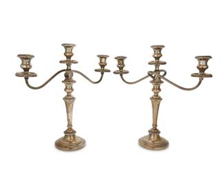 1349
A pair of Gorham weighted sterling silver candelabra
Early/mid-20th century
Each marked for Gorham and for sterling; numbered: 1771
The three-light candelabra, each with turned standard issuing two arms
2 pieces
Each: 15.25" H x 15" W
Estimate: $400 - $600