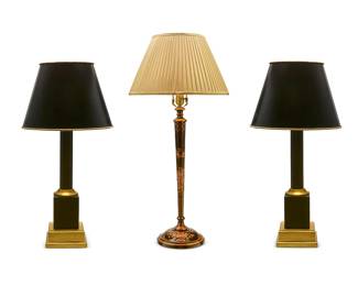 1299
A japanned candlestick lamp and a pair of parcel gilt and ebonized lamps
Late 20th century
The japanned lamp with figures and flowers on a black ground, with pleated fabric shade, the pair of black and gilt columnar lamps with black paper shades, electrified
3 pieces
Pair overall: 29" H x 14.75" Dia.; Single overall: 33.5" H x 16.5" Dia.
Estimate: $200 - $300