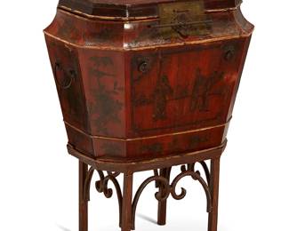 1124
A Chinese brass-mounted lacquered wood marriage chest
19th century
The chest with hinged lid and latch lock, raised on a later iron stand
Overall: 28" H x 21" W x 16" D; Chest: 18" H
Estimate: $300 - $500