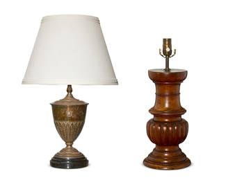 1036
Two table lamps
20th century
Metal monogrammed: CBV
Comprising a silvered metal urn mounted as a single-light table lamp, surmounted by a fabric shade, and a turned and gadrooned wood baluster-form table lamp, electrified
2 pieces
Metal overall: 23" H; Shade: 9.75" H x 14.5" Dia.; Wood lamp: 19.25" H x 7.5" Dia.
Estimate: $100 - $200