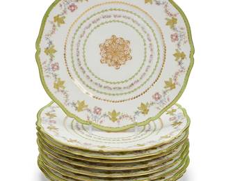 1232
A set of nine Théodore Haviland Limoges porcelain dessert plates
20th century
Each red printed: Théodore Haviland / Limoges / France; and impressed: TH
Each with pale green, pink, blue and gilt floral decoration, personalized
9 pieces
Each: 9" Dia.
Estimate: $200 - $300