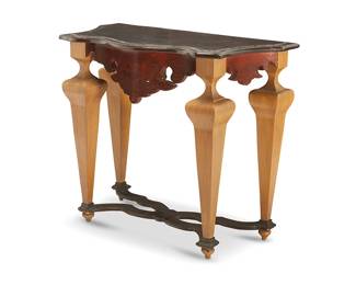 1272
A Baroque-style faux painted wood console table
Late 20th century
With a dark brown top, reddish brown apron, and gold-toned attenuated legs
37" H x 42" W x 22" D
Estimate: $300 - $500