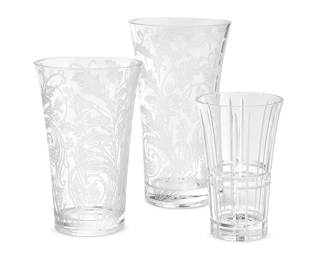1218
Three Christofle glass vases
Late 20th/early 21st century
Each with etched factory mark
Comprising two Christofle clear and frosted glass 'Marly' vases with vinery decoration, and a Christofle ribbed flared cut glass vase
3 pieces
Largest: 11.75" H x 6.5" Dia.; Smallest: 8" H x 5" Dia.
Estimate: $150 - $250