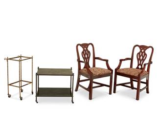 1162
A pair of Baker Furniture armchairs and two associated tables
Late 20th/early 21st century
Comprising a pair of George III-style mahogany open armchairs with fabric upholstered seats (Each: 38" H x 23" W x 21" D), a faux green marble two-tier table raised on four tubular metal legs with casters (21.25" H x 25" W x 19.5" D), and a brass stand on casters (29" H x 15" W x 14" D)
4 pieces
Estimate: $100 - $200