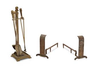 1319
A pair of andirons and fireplace tools
20th century
Comprising a pair of Art Deco-style andirons and a set of brass fireplace tools, including a broom, a shovel, a pair of tongs, a poker, and a stand
7 pieces
Each andiron: 17" H x 10" W x 22" D; Stand with tools: 35" H x 11" W x 11" D
Estimate: $400 - $600