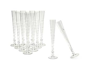 1072
A set of twelve Continental etched glass champagne flutes
20th century
Each with etched grapevine decoration and applied twists
12 pieces
11.5" H
Estimate: $100 - $200