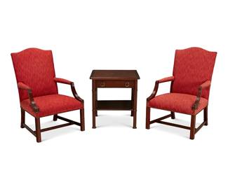 1068
A pair of Kindel George III-style mahogany armchairs together with a side table
Late 20th century
Each chair with fluted arms and legs joined by an H-stretcher, upholstered in a wine-colored fabric with brass tacking, together with a similarly designed Smith and Watson bamboo cluster end side table with a single long drawer
3 pieces
Each chair: 39" H x 23.5" W x 26" D; Table: 26" H x 24" W x 24" D
Estimate: $300 - $500