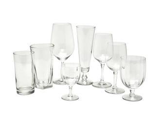 1234
An assembled group of glass stem and barware items
20th/21st century
Comprising various wine glasses, tumblers, pilsner and highball glasses
43 pieces
Ranging from 4.5" to 8.5" H
Estimate: $100 - $200