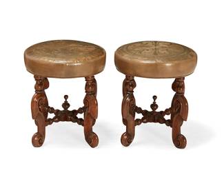 1160
A pair of Baroque-style turned wood stools
19th century with later elements
Each stool with later olive green leather upholstery embossed with a fleur-de-lis pattern
2 pieces
Each: 17" H x 16" Dia.
Estimate: $200 - $300