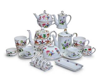 1075
Three Continental porcelain tea and breakfast services
20th/early 21st century
Crown Staffordshire with printed factory mark above pattern name; Some with Polish marks in green; each breakfast item variously numbered
Comprising a Polish Wloclawek tea service including a lidded coffee pot (6.25" H), a lidded teapot, and a pair of teacups with saucers, each decorated with purple violets; a breakfast set including a three-part teapot (5.25" H), a toast rack, a dish with covered dome (6.25" H), and a rectangular dish (6.75" W x 3.4" D), each decorated with multicolored flowers; a Crown Staffordshire 'Hunting Scene' tea service including a teapot, a cream jug, an open sugar, and two mugs
15 pieces
Estimate: $200 - $300