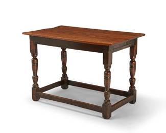 1301
A William & Mary-style carved oak side table
19th century, with later alterations
The rectangular top raised on turned legs joined by a box stretcher
29" H x 43" W x 25.5" D
Estimate: $300 - $500