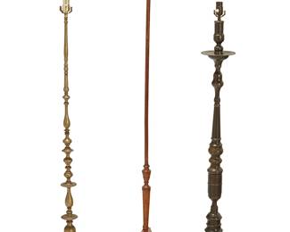1260
Three turned standard floor lamps
20th century
Each a single-light lamp, comprising one brass on a hexagonal base (51" H), one metal (57" H), and one wood with a tripartite base (57.5" H), electrified
3 pieces
Estimate: $200 - $300