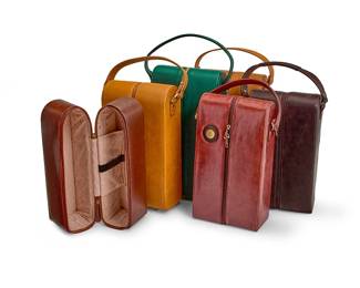 1116
A group of leather wine carriers
Late 20th/21st century
Most variously marked for maker
Comprising six tall leather hard-sided zip-front bags for two bottles, in various colors and by various makers including Tyler Ellis and Le Donne
6 pieces
Largest: 14.75" H x 8" W x 4" D
Estimate: $300 - $500