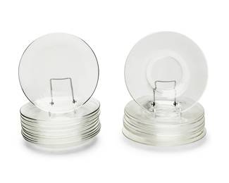 1158
Two sets of Steuben clear glass plates
Late 20th century
Each etched: Steuben
Comprising a set of eight with a center well and a set of ten without
18 pieces
Each: 8.5" Dia.
Estimate: $150 - $250