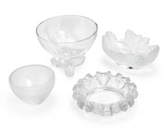 1093
A group of Lalique glass table items
Late 20th/early 21st century; France
Three etched: Lalique ® France [post-1978]; one with block lettering factory mark and numbered: 16730
Comprising a clear and frosted glass 'Compiegne' leaf-form bowl (4" H x 7.75" W x 6" D), a clear and frosted glass 'Cannes' ashtray (2.5" H x 8" Dia.), and a 'Igor' caviar server with internal bowl, lacking metal support (Larger: 6" H x 7.75" Dia.), together with an associated metal stand and clear glass liner
6 pieces
Estimate: $400 - $600