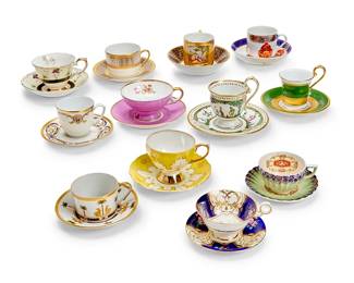 1095
Twenty-seven assorted pairs of ceramic cups and saucers
Late 19th-21st century
Some variously marked for maker
Comprising some porcelain, some ceramic, including teacups, coffee cups, and demitasse cups
54 pieces
Tallest teacup 4.5" H; Largest saucer: 7" Dia.
Estimate: $200 - $300