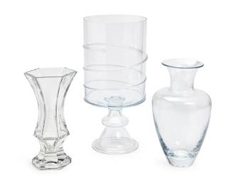 1159
Three Contemporary glass vases
Late 20th/early 21st century
Gorham with stencil mark; the others with etched marks
Comprising a Juliska cylindrical footed vase with applied spiral decoration (15.5" H x 7.75" Dia.), a Simon Pearce blown glass baluster vase (11.5" H x 7" Dia.), and a Gorham flared hexagonal footed vase (10.25" H x 5.5" Dia.)
3 pieces
Estimate: $100 - $200