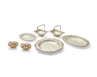 1346
A group of silver-plated serving items
20th century
Most variously marked for maker
Comprising a group of five handled items, including a pair of footed baskets, a pair of gilt-metal pierced baskets, and a basket with ball and claw feet; and four bowls, each similarly decorated with a heavily chased surface and an elaborate rim, including a round bowl, a pair of graduated oval trays, and an oval footed bowl
9 pieces
Largest round: 17.5" Dia.; Largest oval: 18.25" W x 13.5" D; Larger baskets: 4.5" H x 10.5" W x 8.5" D
Estimate: $200 - $300