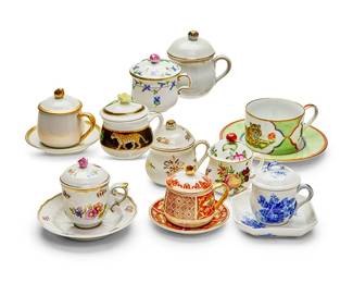 1204
A collection of porcelain pot de crème cups
20th/early 21st century
Various factory marks
Some with saucers or lids, together with a set of four Lynn Chase porcelain 'Tiger Raj' teacups and saucers
65 pieces
Tallest 3.75" H; Largest saucer: 6.25" Dia.
Estimate: $300 - $500