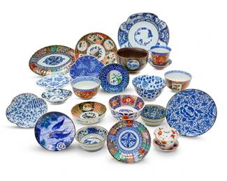 1171
A large group of East Asian porcelain
20th century
Some variously marked to underside
Comprising 26 rice bowls, 8 tea bowls, 2 small lidded bowls, 13 small shallow dishes, 2 scalloped oblong dishes, 7 medium dishes, 8 four-sided scalloped dishes (in 2 sizes), and 5 medium shallow dishes
71 pieces
Largest dish: 1.75" H x 9" W x 8.25" D
Estimate: $200 - $300